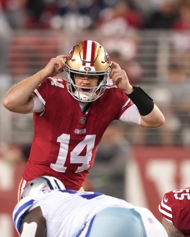 Oct 8, 2023; Santa Clara, California, USA; San Francisco 49ers quarterback Sam Darnold (14) gestures during the fourth quarter against the Dallas Cowboys at Levi's Stadium.
